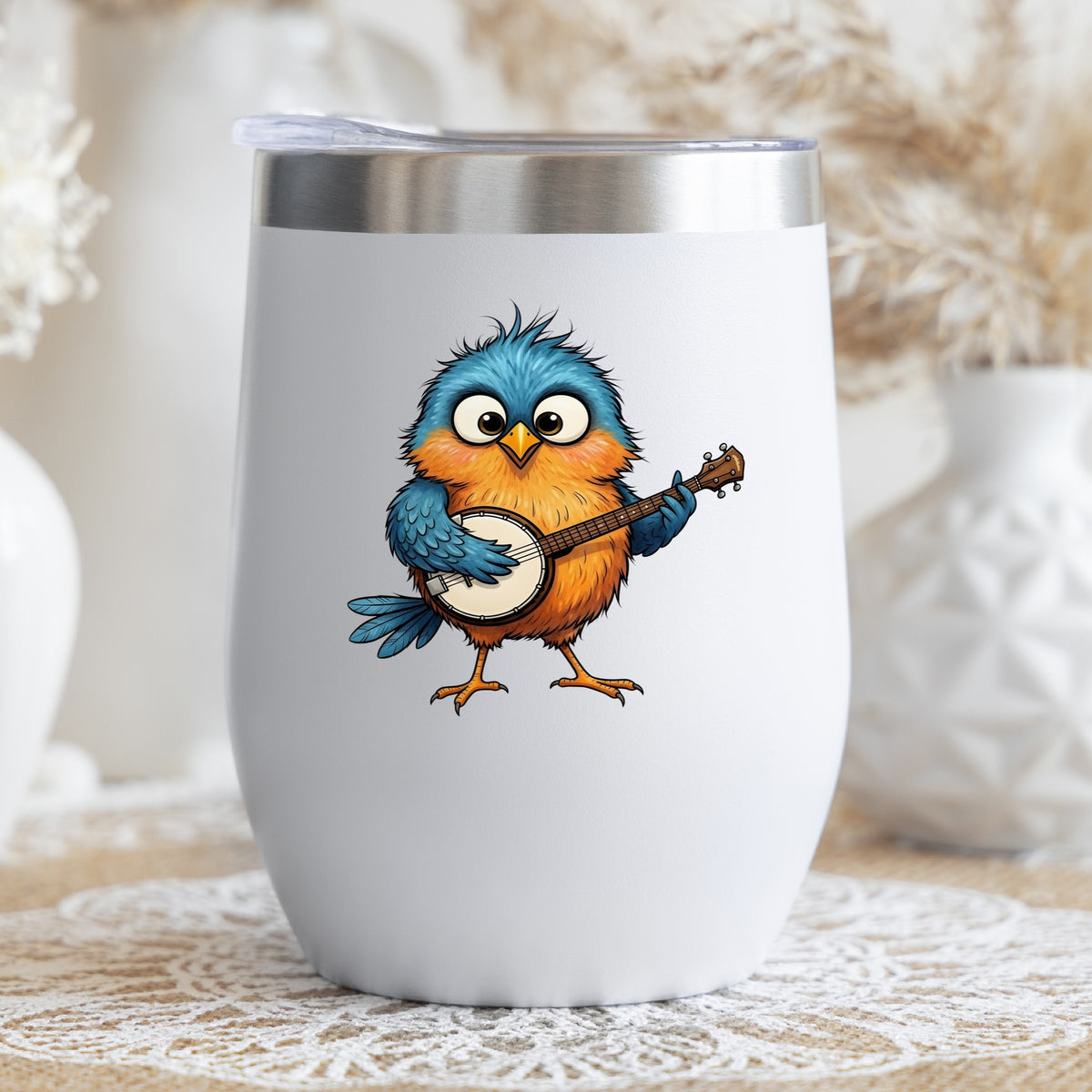 Bird Playing Banjo UV DTF sticker applied to a white stemless tumbler with a lid