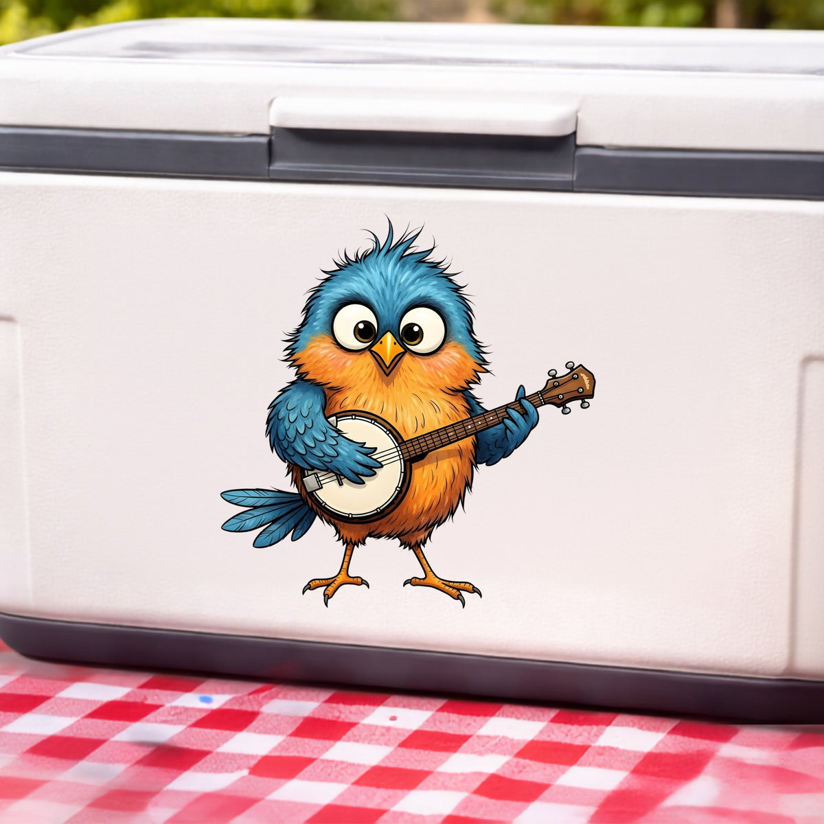 Bird Playing Banjo UV DTF sticker applied to a white cooler on a red gingham cloth