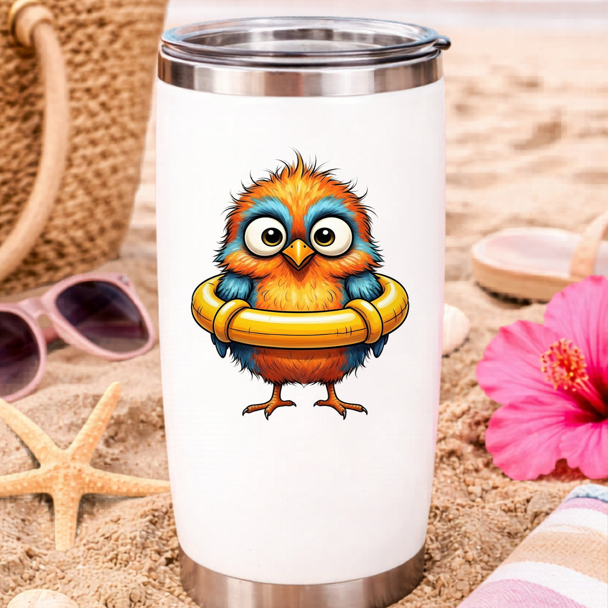 Orange Bird In Swim Ring UV DTF sticker applied to a white travel tumbler on beach sand