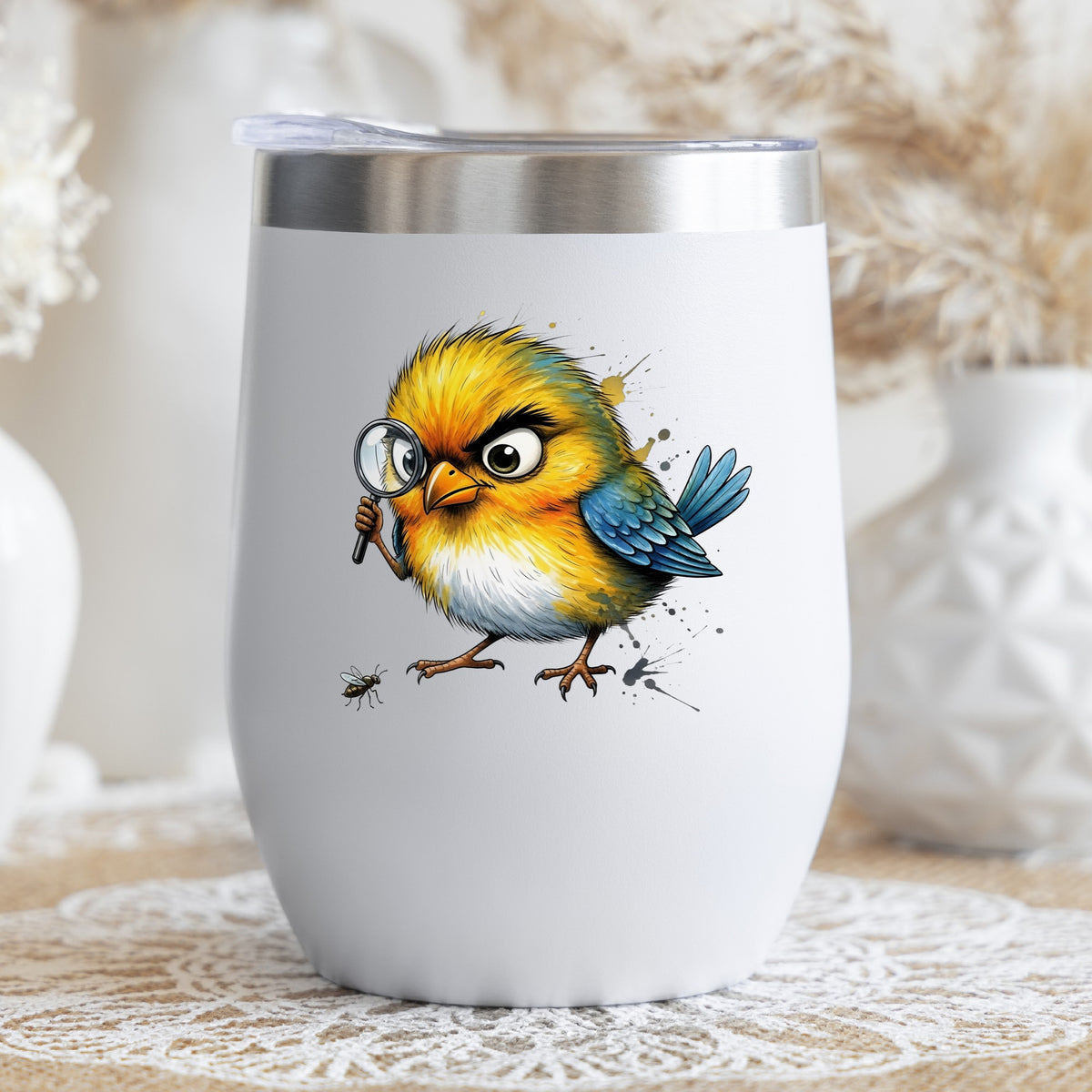 Yellow Bird Magnifying Glass Bug UV DTF sticker applied to a white stemless tumbler with a lid