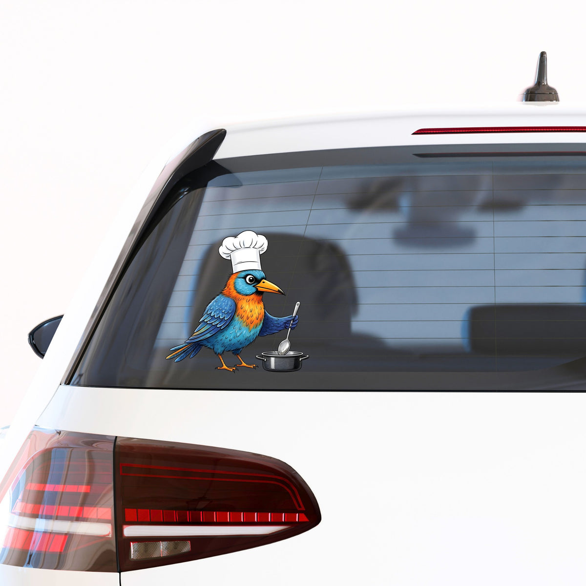 Chef Bird Cooking Pot UV DTF sticker applied to the rear window of a white car