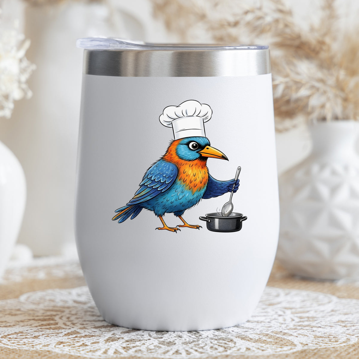 Chef Bird Cooking Pot UV DTF sticker applied to a white stemless tumbler with a lid