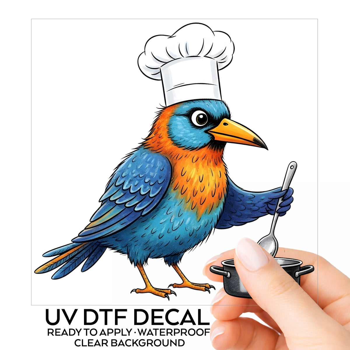 Chef Bird Cooking Pot UV DTF sticker on its backing card, held in hand