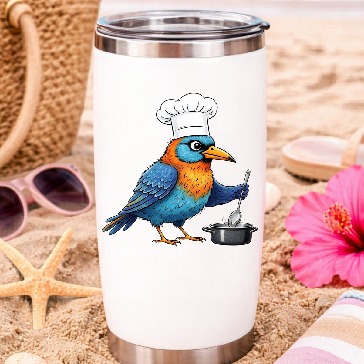 Chef Bird Cooking Pot UV DTF sticker applied to a white travel tumbler on beach sand
