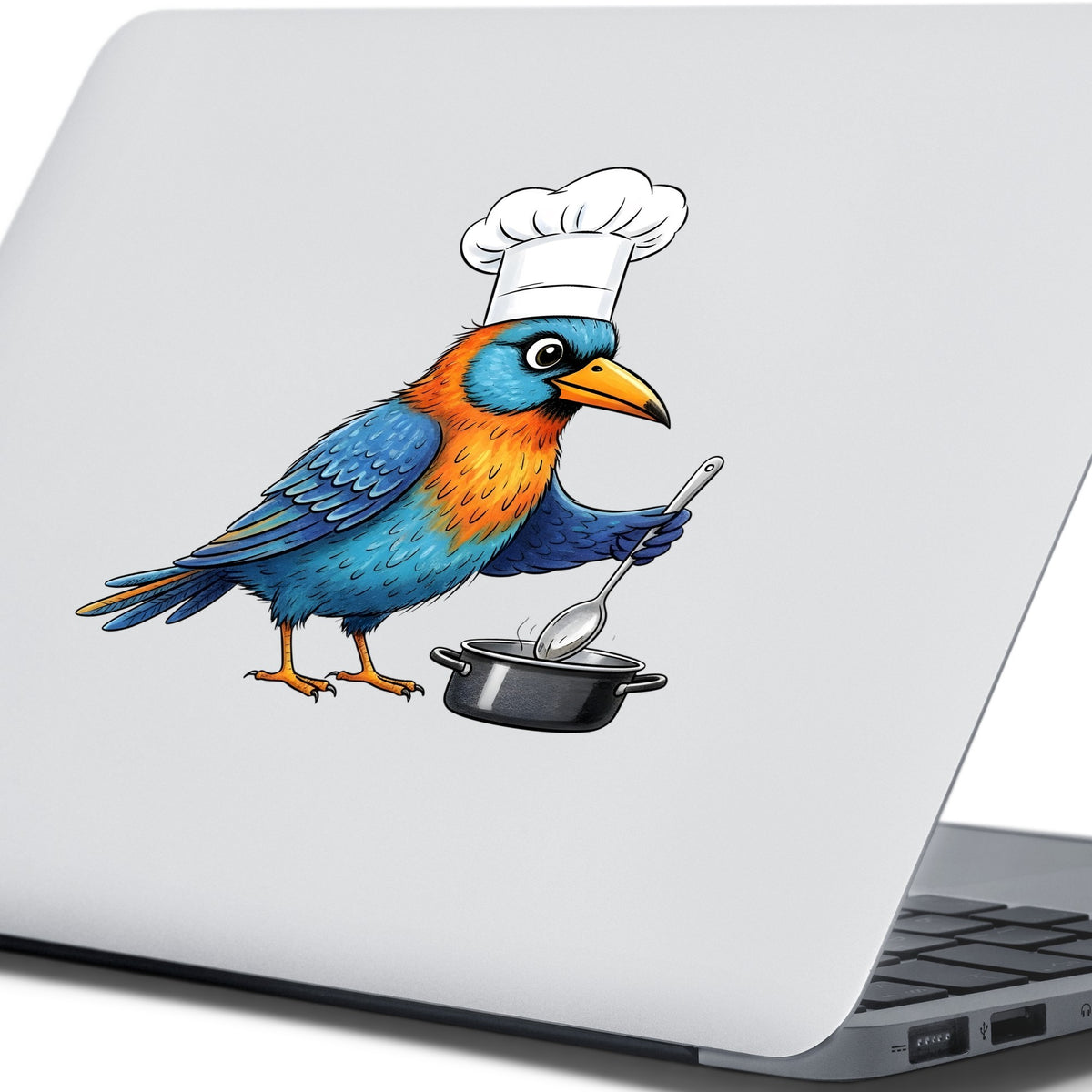 Chef Bird Cooking Pot UV DTF sticker applied to the lid of a silver laptop
