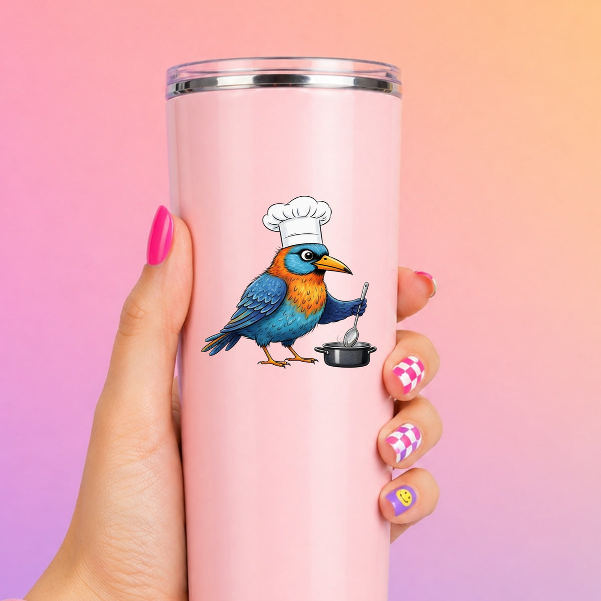 Chef Bird Cooking Pot UV DTF sticker applied to a tall pink tumbler on a pink and orange background