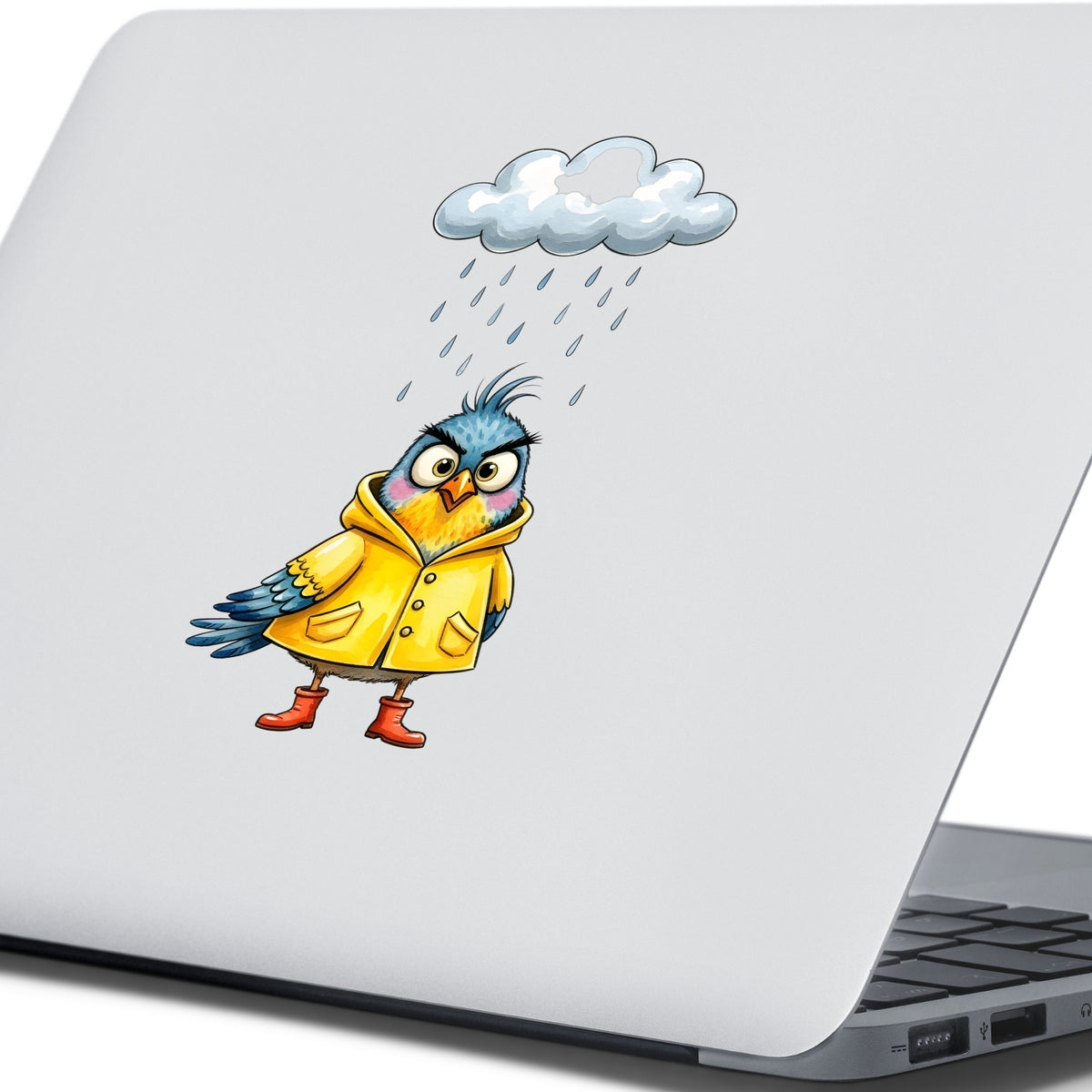 Rain Cloud Bird Yellow Raincoat UV DTF sticker applied to the lid of a silver laptop