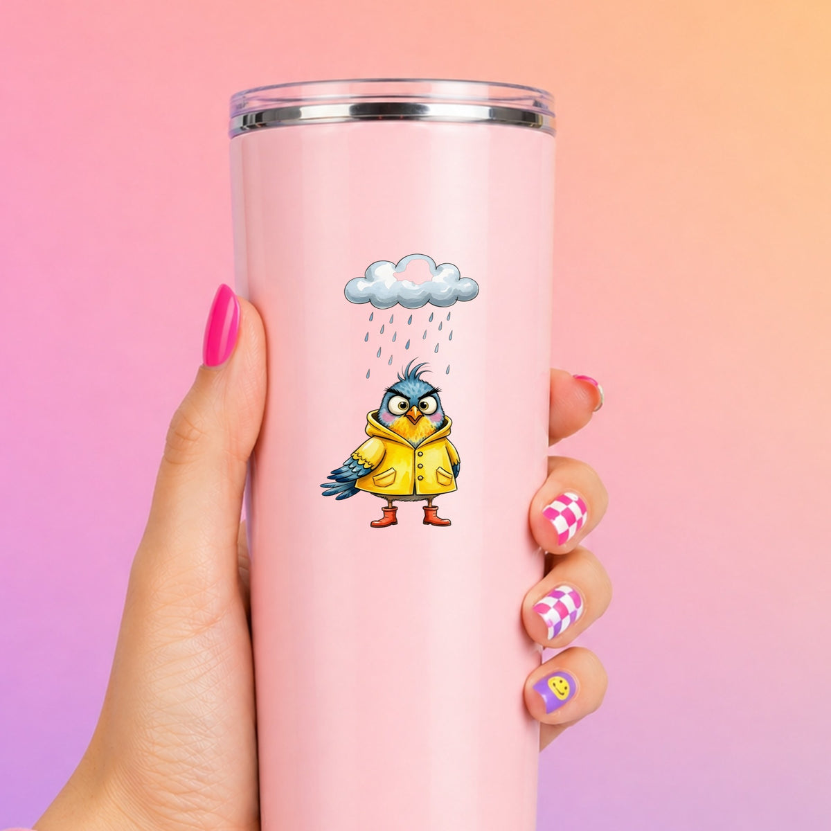 Rain Cloud Bird Yellow Raincoat UV DTF sticker applied to a tall pink tumbler on a pink and orange background