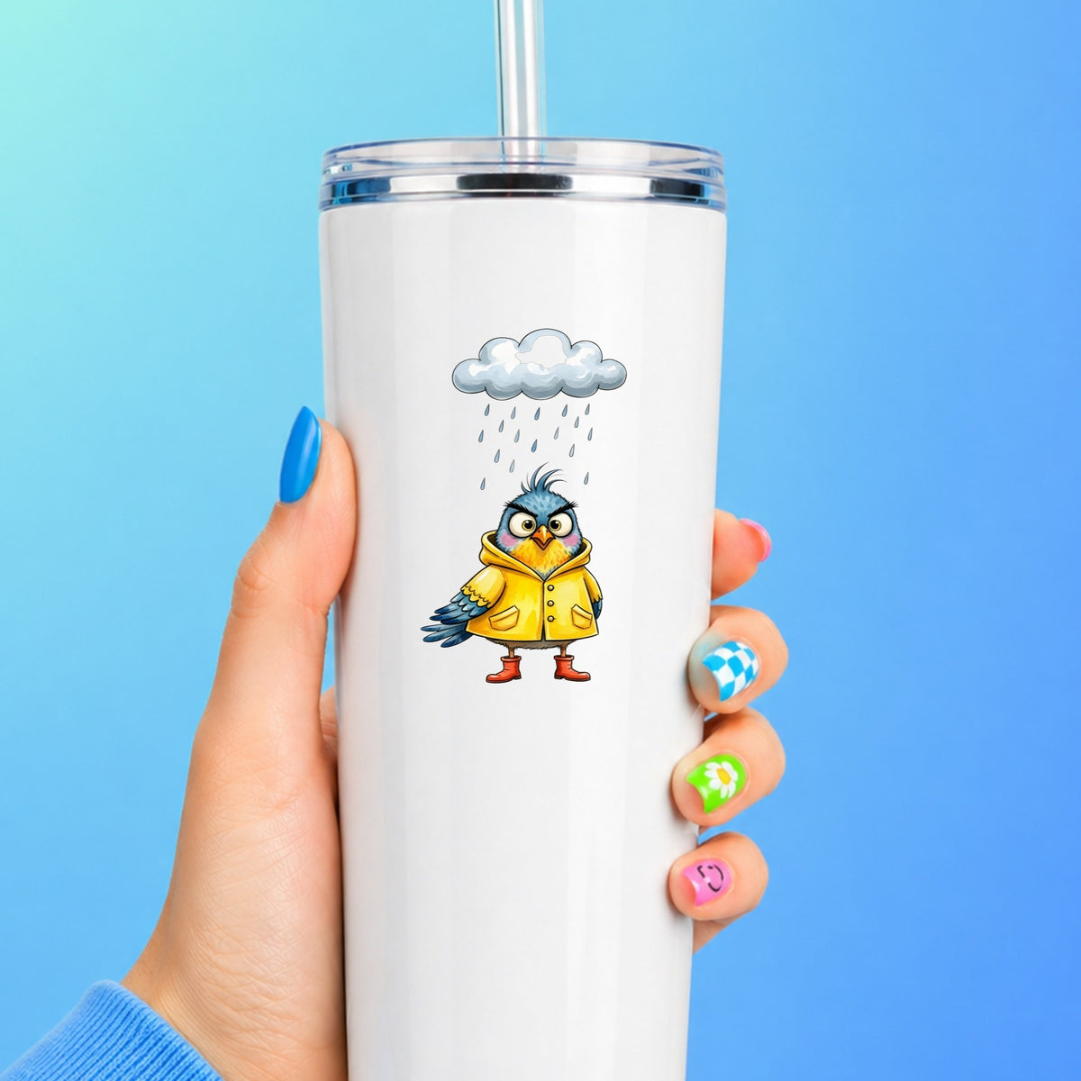 Rain Cloud Bird Yellow Raincoat UV DTF sticker applied to a white straw tumbler on a blue background