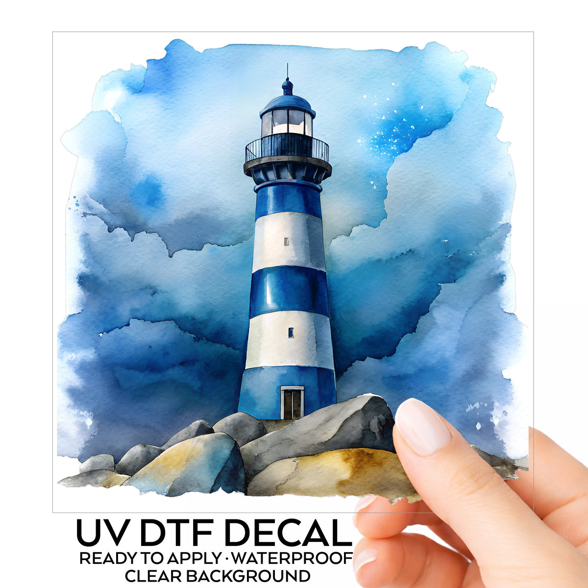 Blue Striped Lighthouse On Rocks UV DTF sticker on its backing card, held in hand
