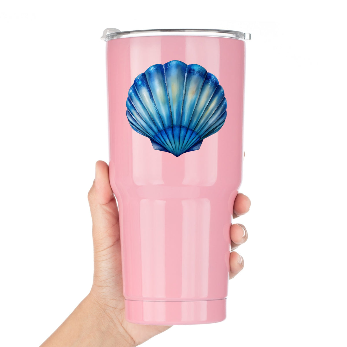 Blue Scallop Seashell UV DTF sticker applied to a pink tumbler held against a white background