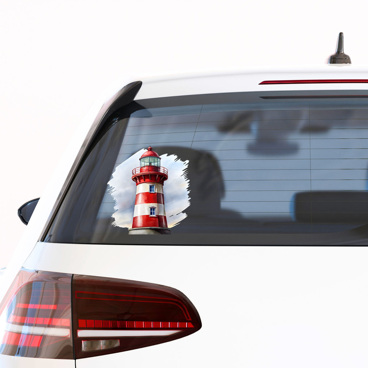 Red And White Lighthouse UV DTF sticker applied to the rear window of a white car