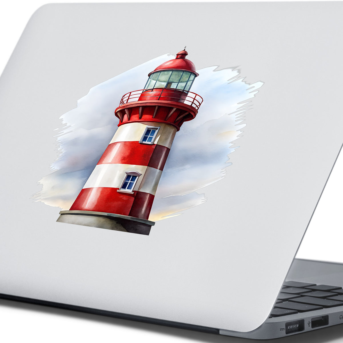 Red And White Lighthouse UV DTF sticker applied to the lid of a silver laptop