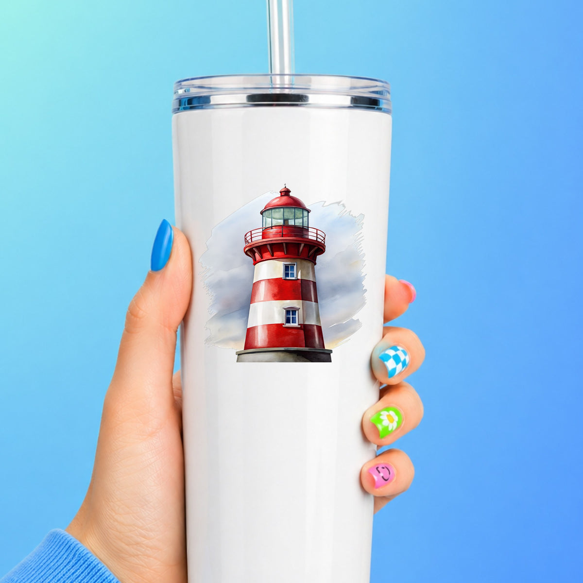 Red And White Lighthouse UV DTF sticker applied to a white straw tumbler on a blue background