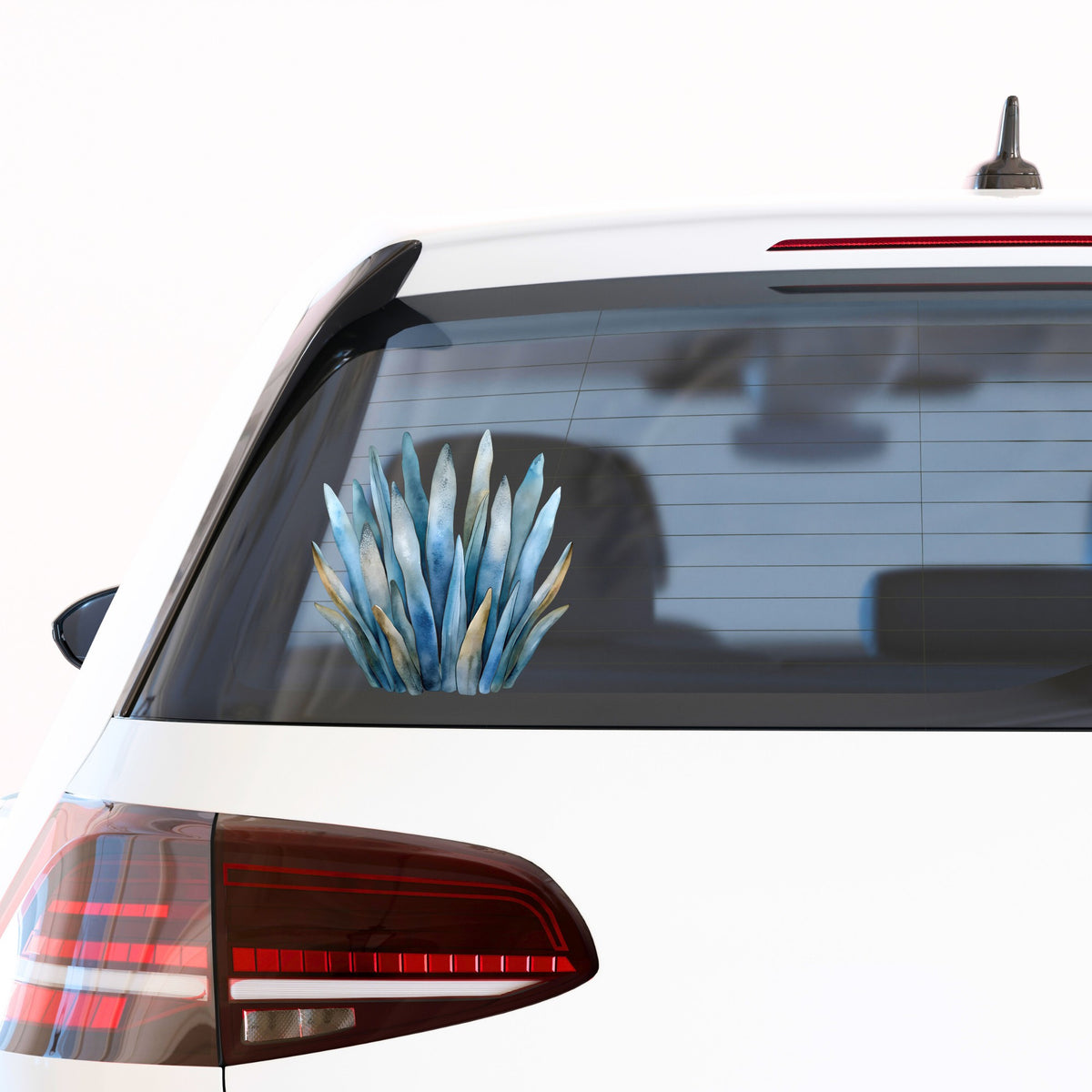 Blue Coastal Sea Grass UV DTF sticker applied to the rear window of a white car