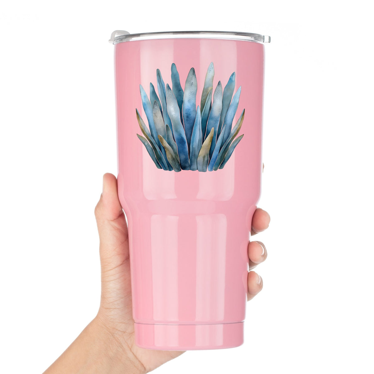 Blue Coastal Sea Grass UV DTF sticker applied to a pink tumbler held against a white background