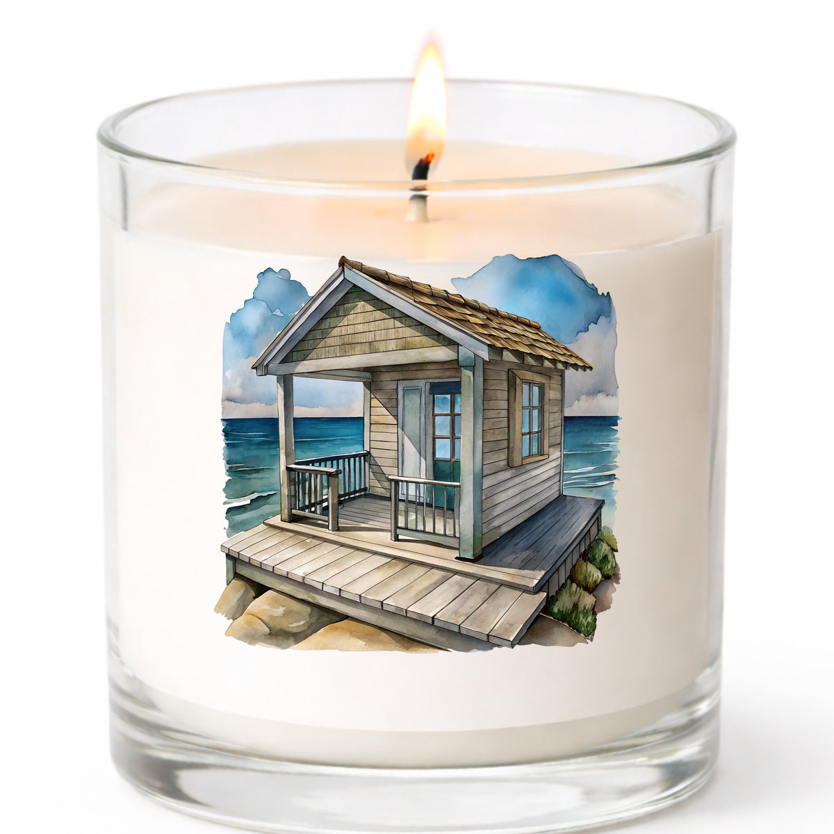 Beach Cottage Porch Ocean View UV DTF sticker applied to a white candle in a clear glass jar