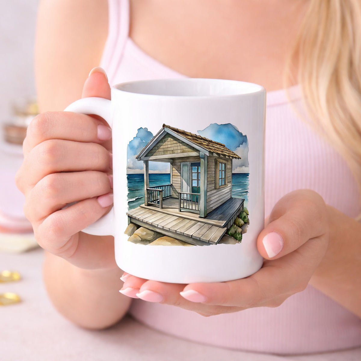 Beach Cottage Porch Ocean View UV DTF sticker applied to a white coffee mug held in both hands