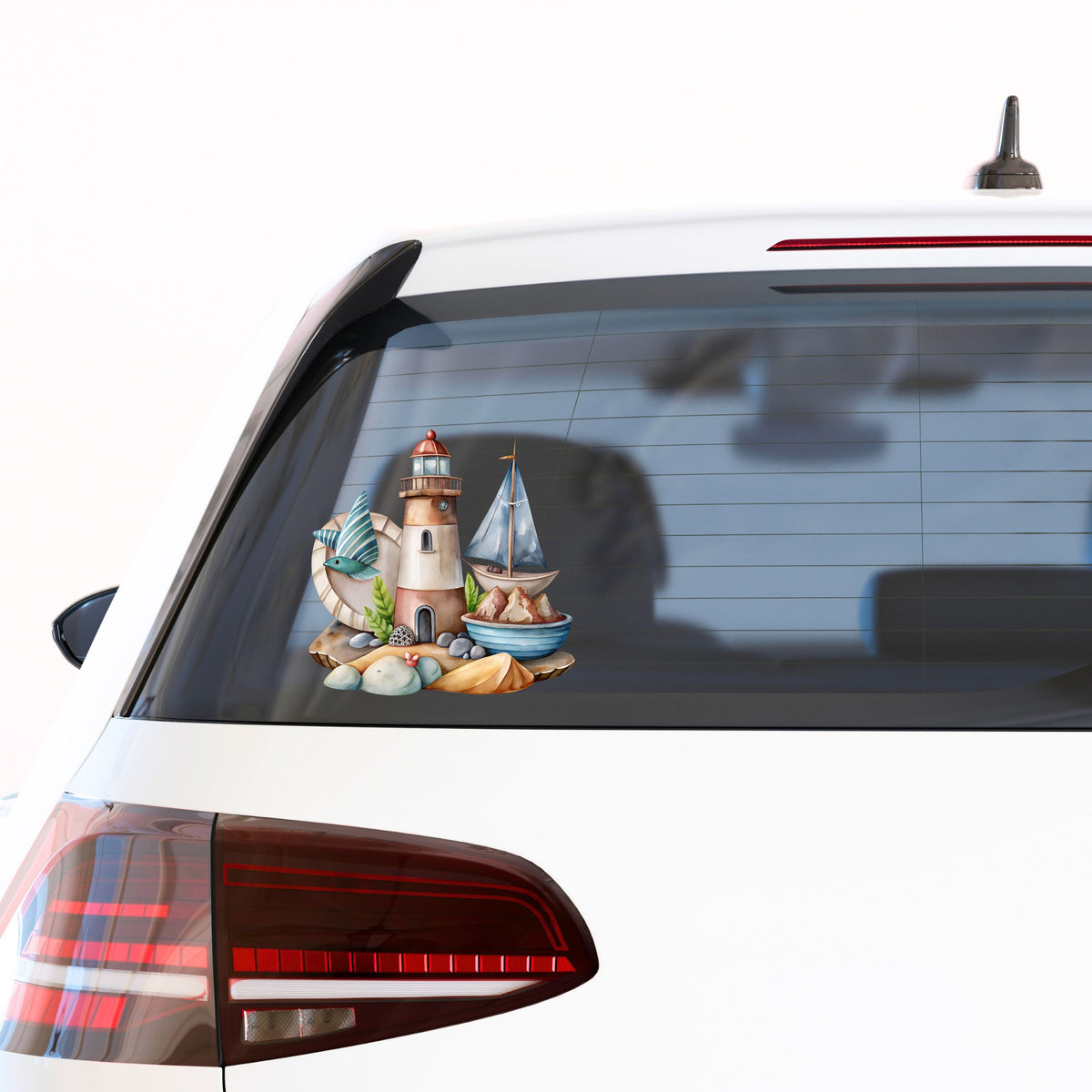 Lighthouse Sailboat Seaside Scene UV DTF sticker applied to the rear window of a white car