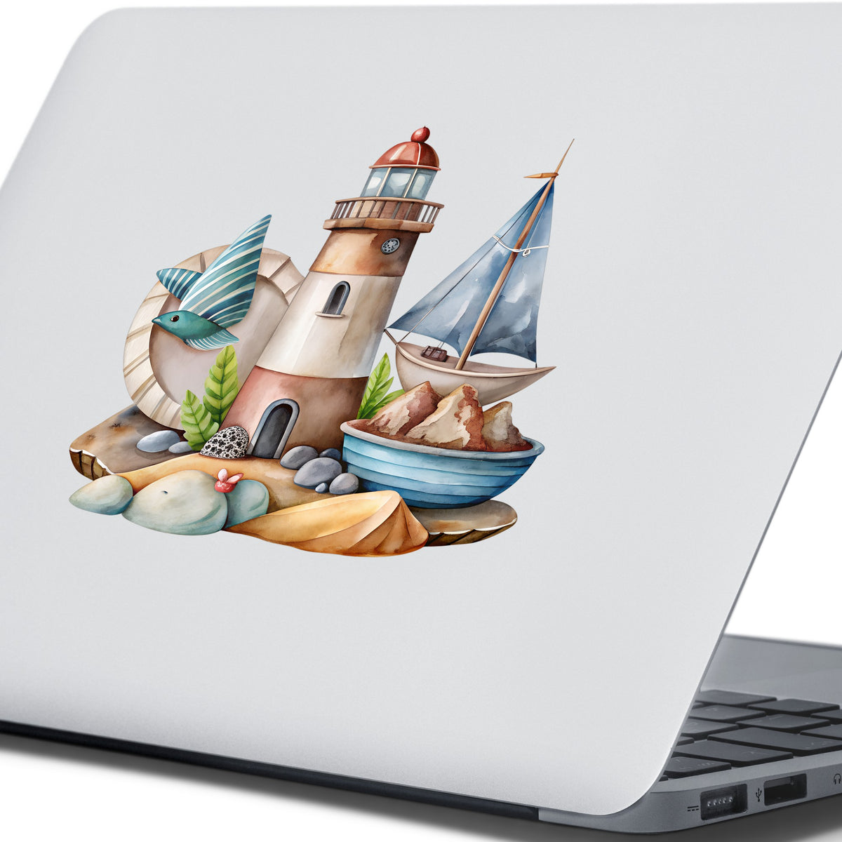 Lighthouse Sailboat Seaside Scene UV DTF sticker applied to the lid of a silver laptop
