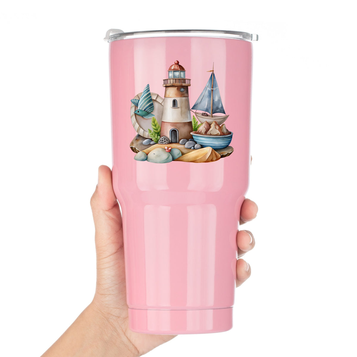 Lighthouse Sailboat Seaside Scene UV DTF sticker applied to a pink tumbler held against a white background