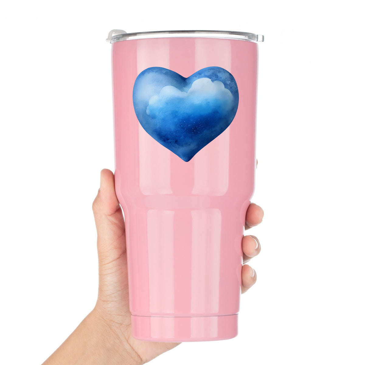 Blue Watercolor Heart With Clouds UV DTF sticker applied to a pink tumbler held against a white background