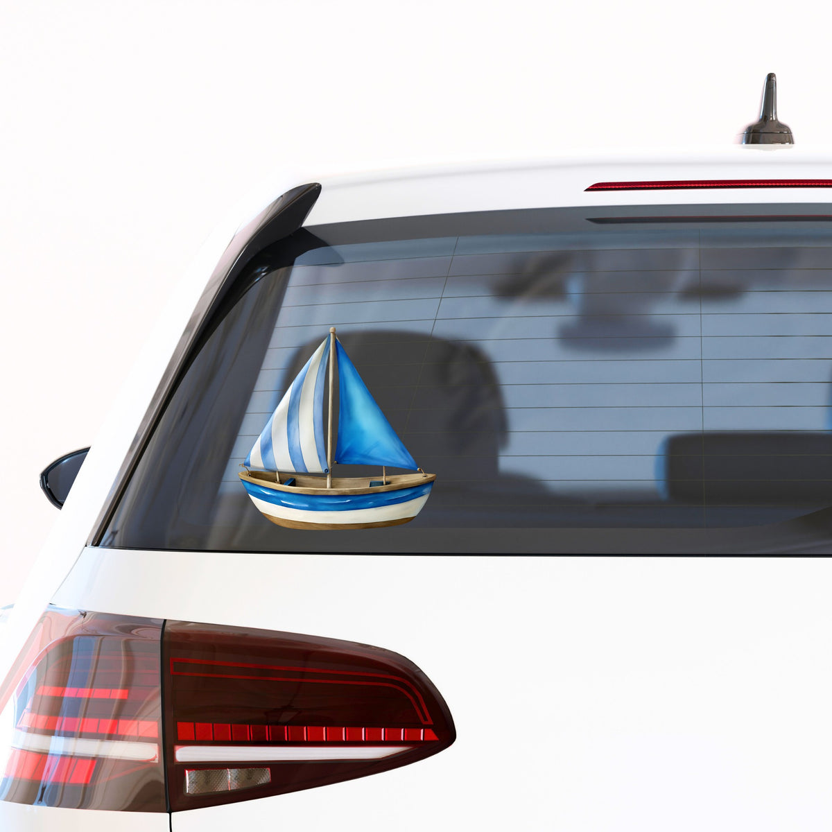 Blue Striped Sailboat UV DTF sticker applied to the rear window of a white car