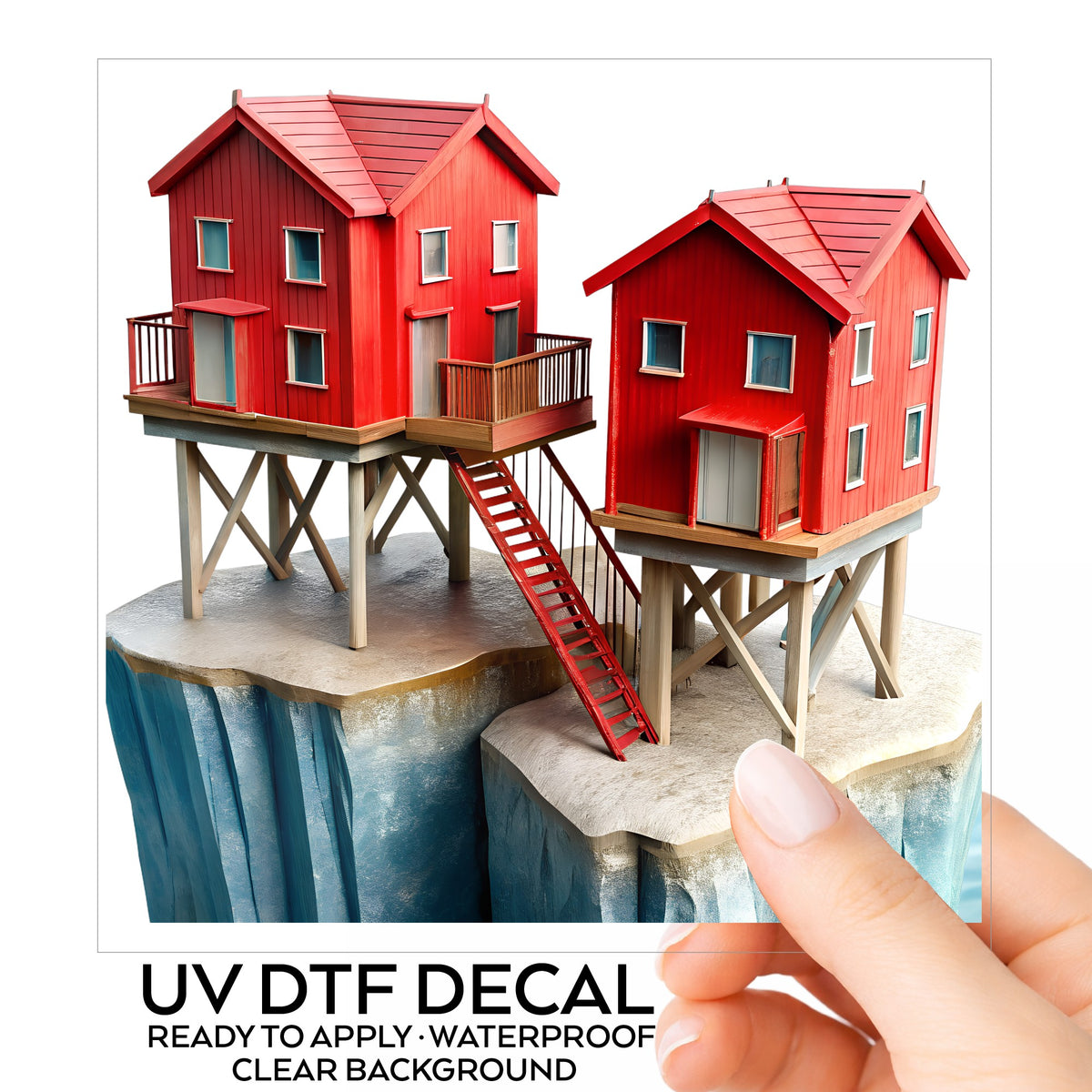 Red Houses On Stilts Cliff UV DTF sticker on its backing card, held in hand