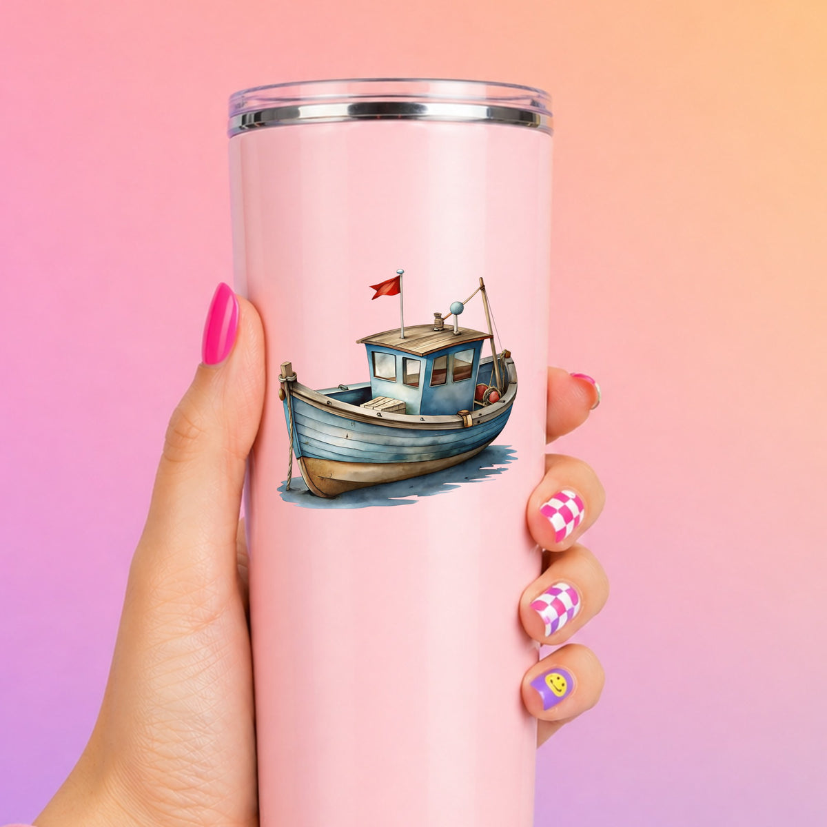 Wooden Fishing Boat With Red Flag UV DTF sticker applied to a tall pink tumbler on a pink and orange background