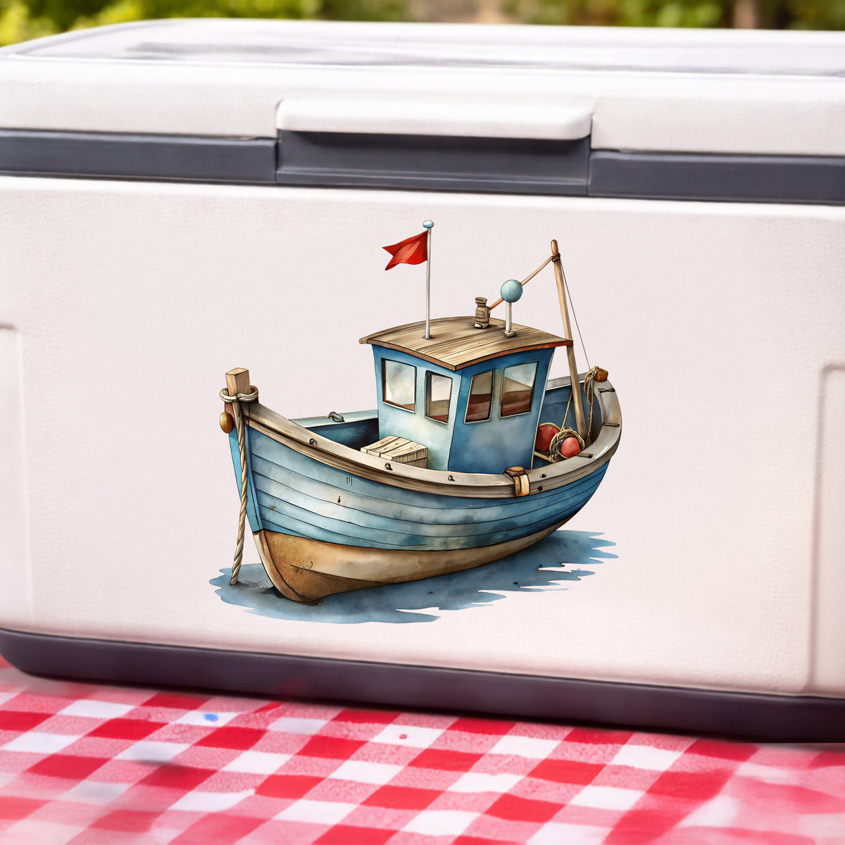 Wooden Fishing Boat With Red Flag UV DTF sticker applied to a white cooler on a red gingham cloth