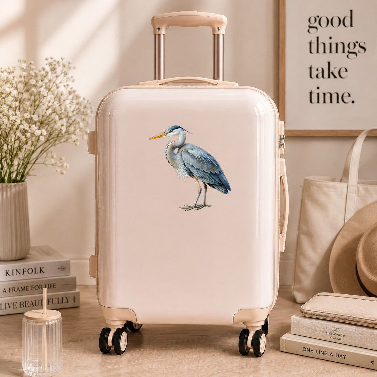 Great Blue Heron UV DTF sticker applied to a cream carry-on suitcase