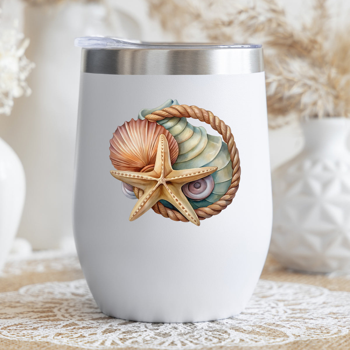 Seashells Starfish Rope Circle UV DTF sticker applied to a white stemless tumbler with a lid