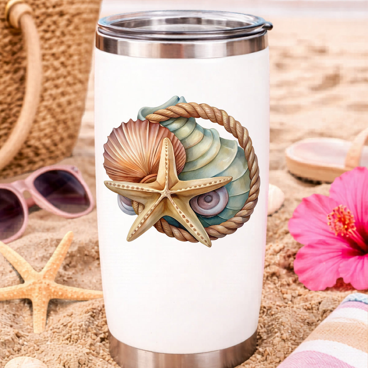 Seashells Starfish Rope Circle UV DTF sticker applied to a white travel tumbler on beach sand