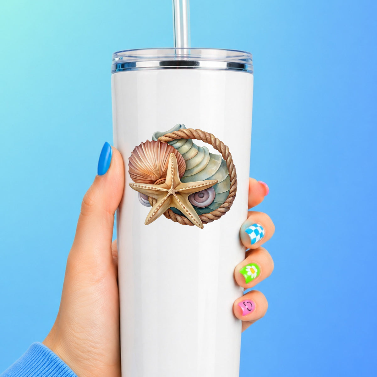 Seashells Starfish Rope Circle UV DTF sticker applied to a white straw tumbler on a blue background