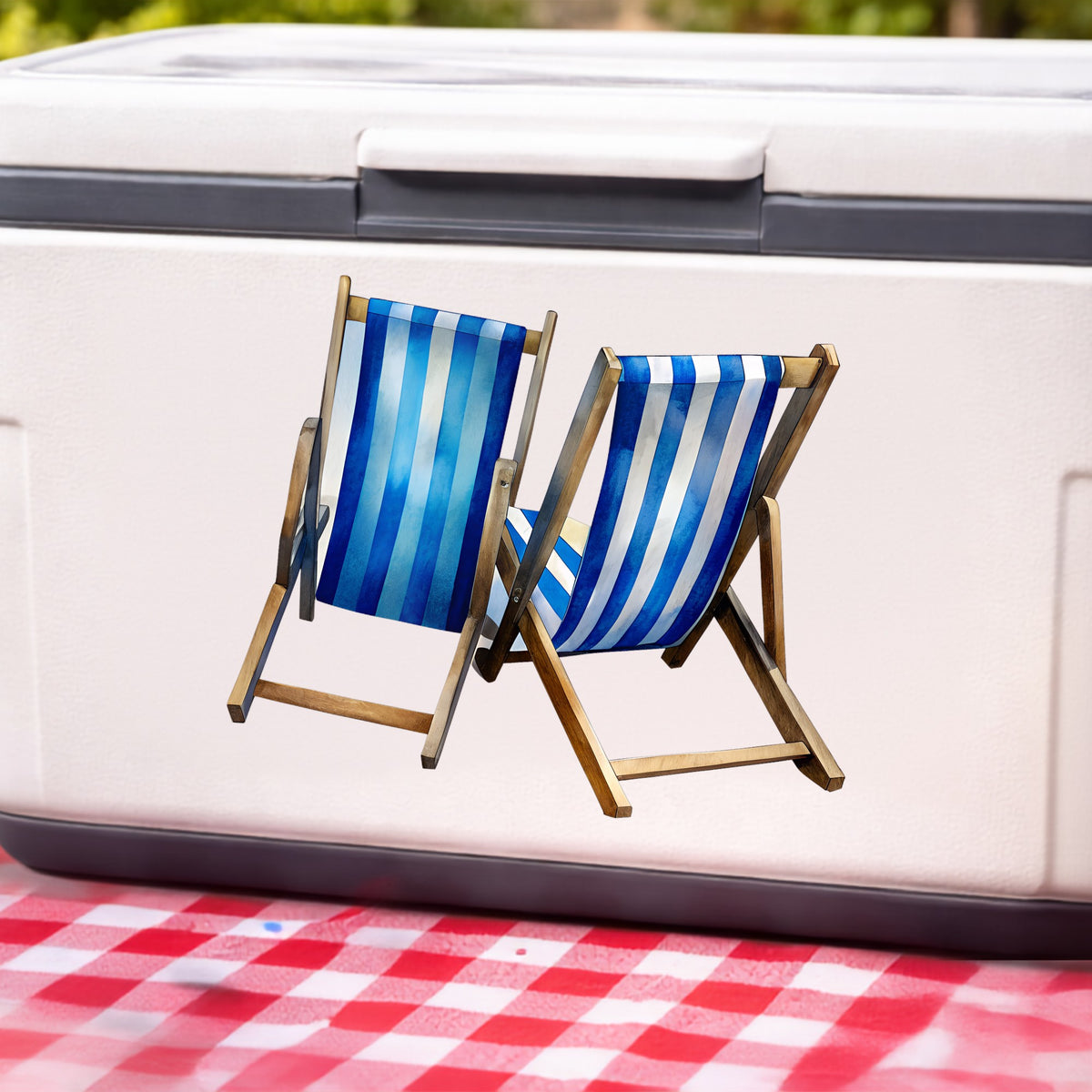 Two Blue Striped Beach Chairs UV DTF sticker applied to a white cooler on a red gingham cloth