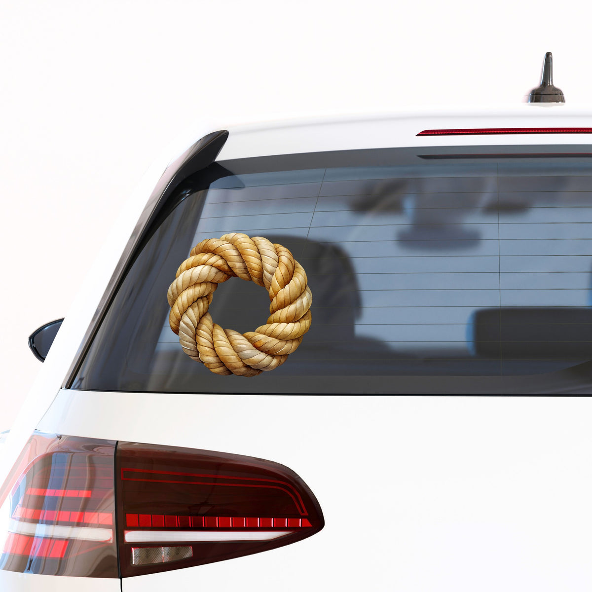Rope Knot Wreath UV DTF sticker applied to the rear window of a white car