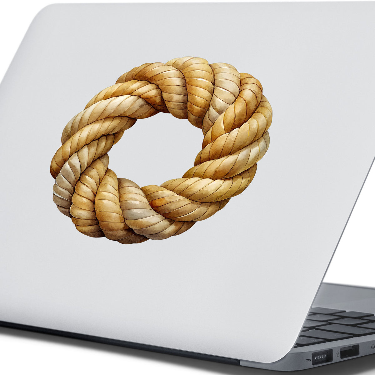 Rope Knot Wreath UV DTF sticker applied to the lid of a silver laptop