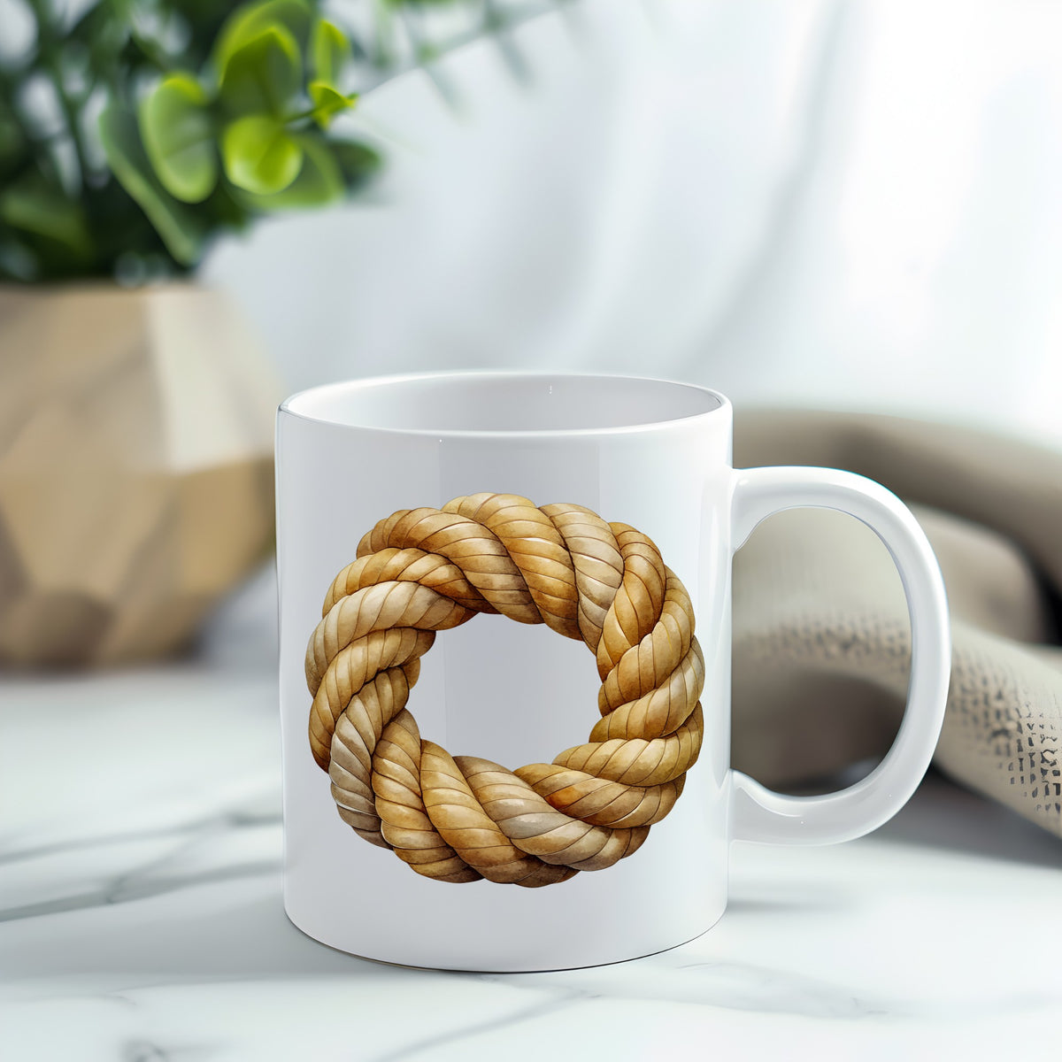 Rope Knot Wreath UV DTF sticker applied to a white coffee mug