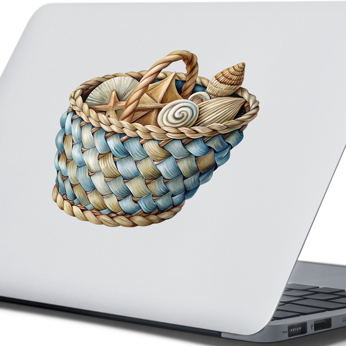 Woven Basket Of Seashells UV DTF sticker applied to the lid of a silver laptop