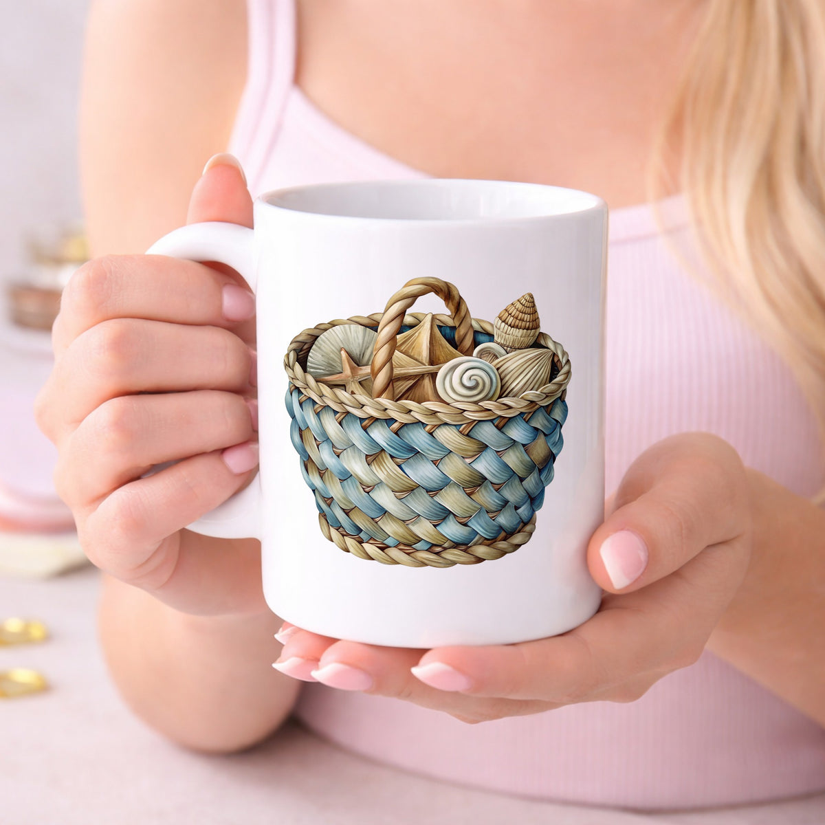 Woven Basket Of Seashells UV DTF sticker applied to a white coffee mug held in both hands