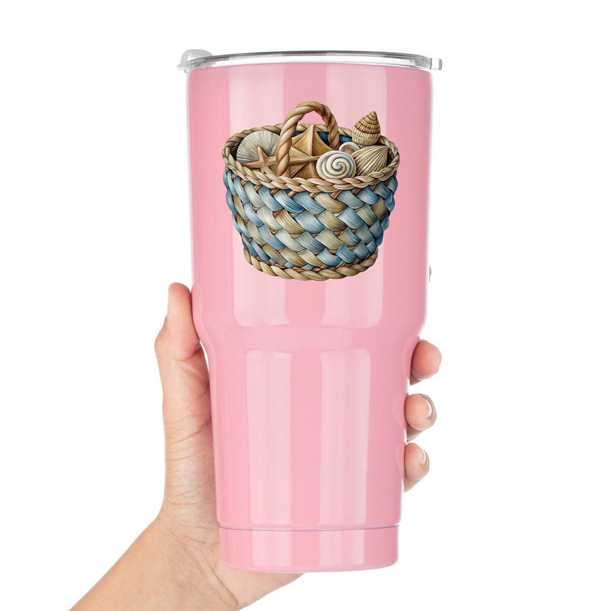 Woven Basket Of Seashells UV DTF sticker applied to a pink tumbler held against a white background
