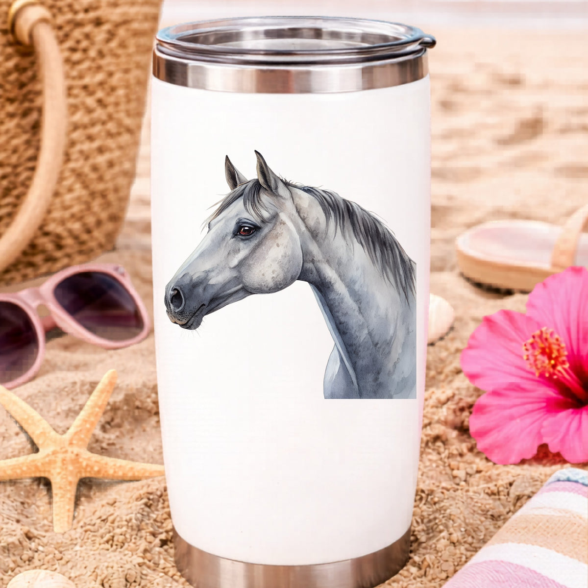Dapple Gray Horse Portrait UV DTF sticker applied to a white travel tumbler on beach sand