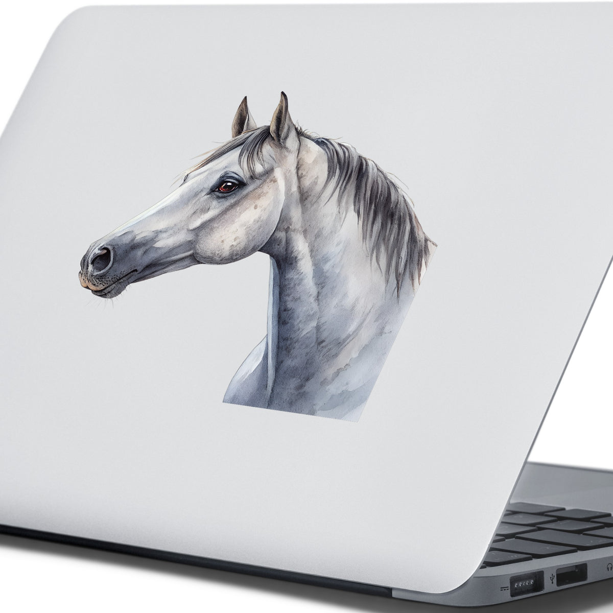Dapple Gray Horse Portrait UV DTF sticker applied to the lid of a silver laptop