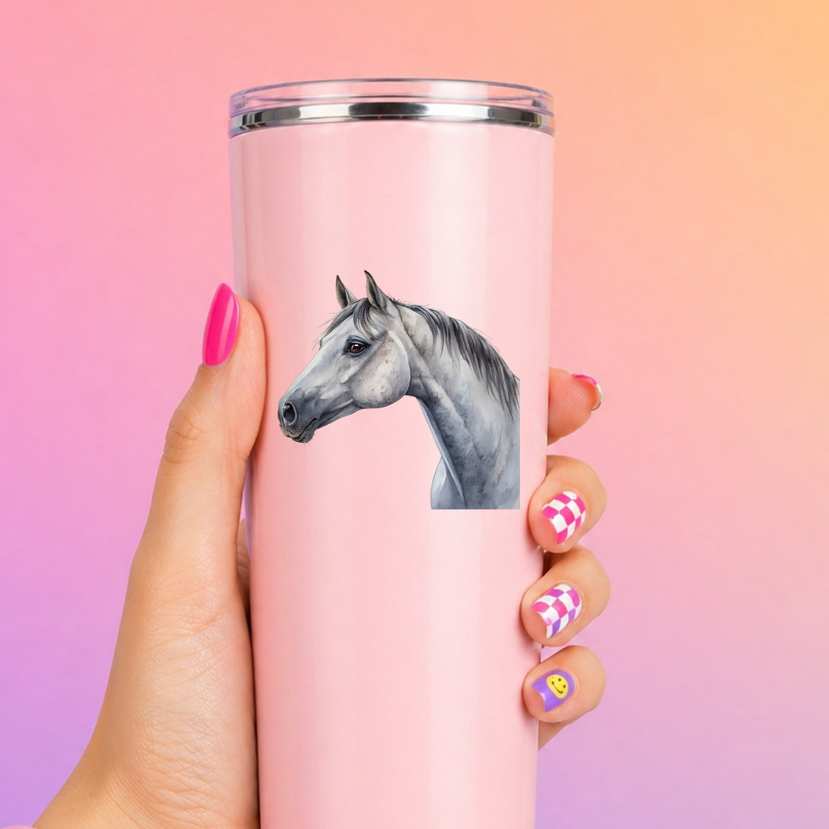 Dapple Gray Horse Portrait UV DTF sticker applied to a tall pink tumbler on a pink and orange background