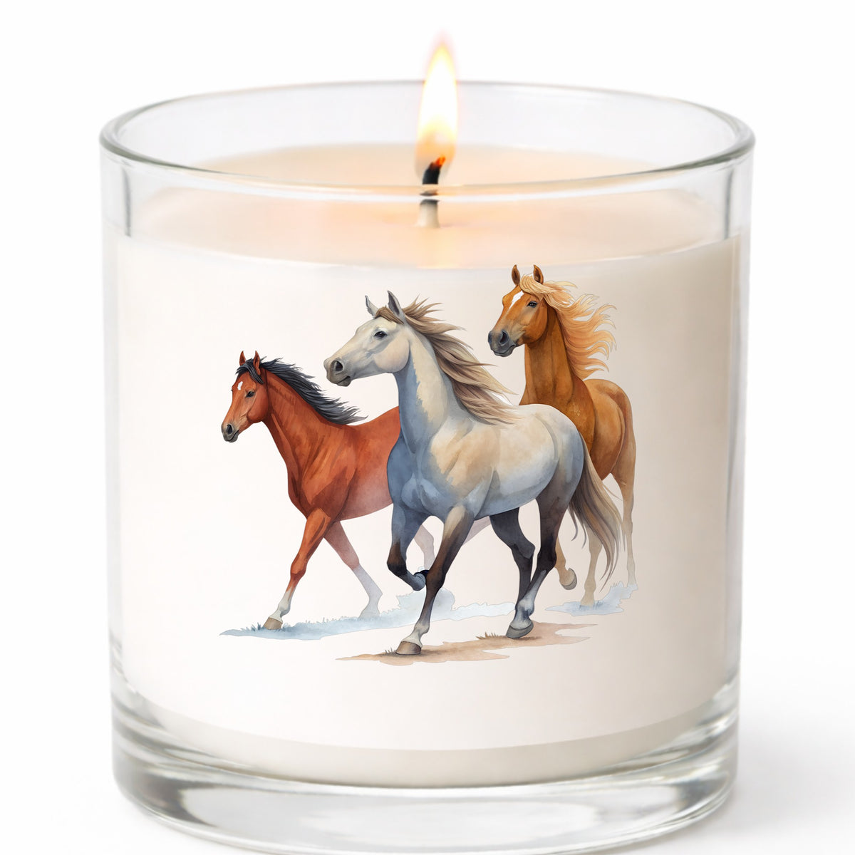 Three Horses Running UV DTF sticker applied to a white candle in a clear glass jar