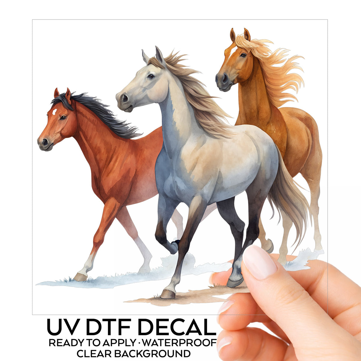 Three Horses Running UV DTF sticker on its backing card, held in hand