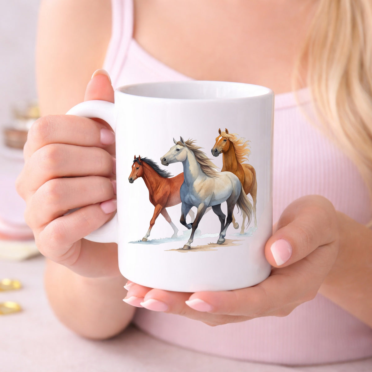 Three Horses Running UV DTF sticker applied to a white coffee mug held in both hands