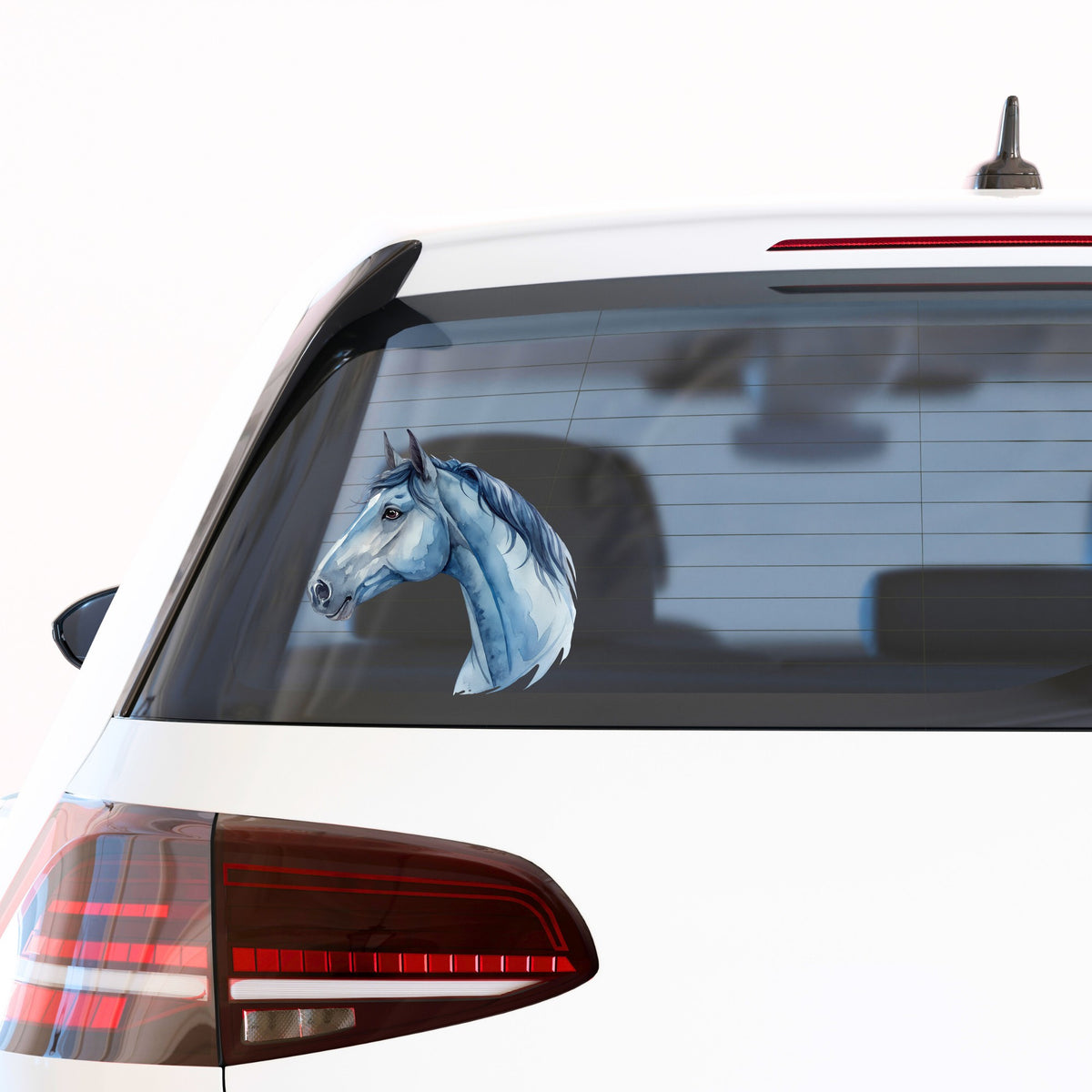 Blue Horse Head UV DTF sticker applied to the rear window of a white car