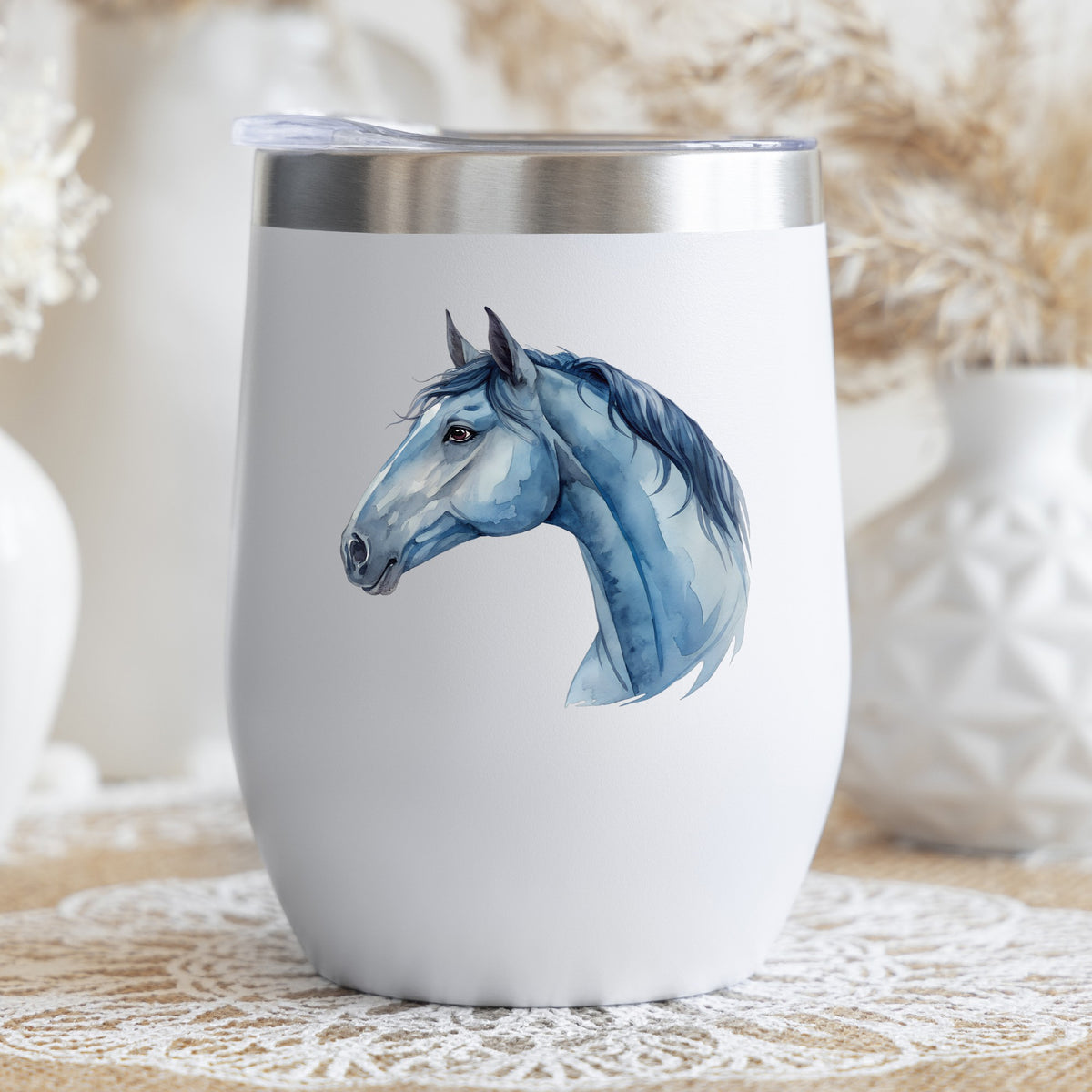 Blue Horse Head UV DTF sticker applied to a white stemless tumbler with a lid