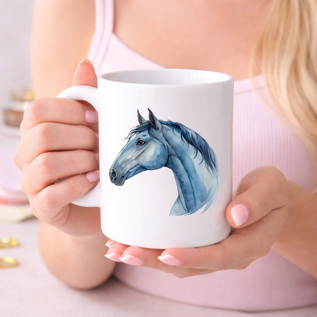 Blue Horse Head UV DTF sticker applied to a white coffee mug held in both hands